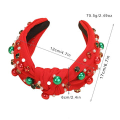 Mejreiik pearl rhinestone headband highlights red and green Christmas style.