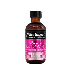 Mia Secret liquid monomer bottle closeup highlights smooth formula for precise acrylic application.