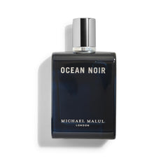 Michael Malul Ocean Noir bottle closeup highlights marine notes for confident daytime wear.