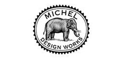 Michel Design Works hand soap bottle with signature medallion emphasizes elegant packaging and premium hand cleansing ritual.