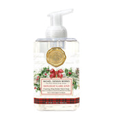 Michel Design Works foaming hand soap pump with holiday garland label for a refined sink experience.