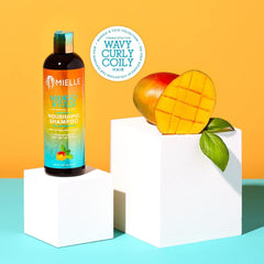 Close-up of mango and tulsi ingredients for scalp hydration