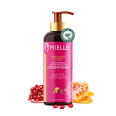 Mielle Organics Pomegranate & Honey detangling conditioner bottle close-up for smooth curls