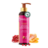 Mielle Organics Pomegranate & Honey conditioner bottle for deep hydration and curl softness.