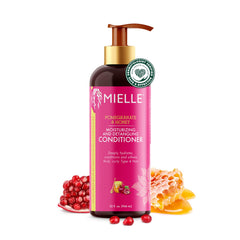 Mielle Organics Pomegranate & Honey detangling conditioner bottle close-up for smooth curls