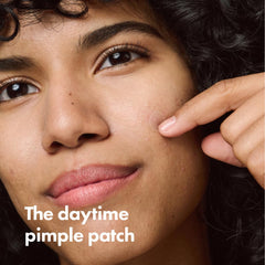 Mighty Patch Invisible+ clear matte patch blending into skin tone during use.