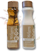 Milagros Herbal Shampoo bottle shows rosemary and ginger ingredients for nourishing roots.
