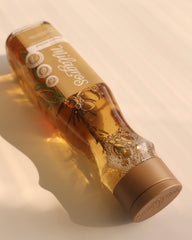 Milagros vitamins and amino acids shampoo ingredients badge suggests fortified scalp nourishment.