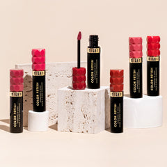 Milani Color Fetish Lip Stain 120 Mahogany Mami semi-matte finish after blot for balanced look.