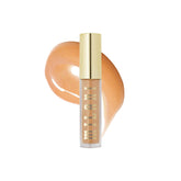 Milani Lip Gloss Keep It Full nourishing bottle shows hydrated, fuller-looking lips.