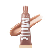 Milk Makeup Balmade Electrolyte Lip Balm pump close-up shows glossy hydration