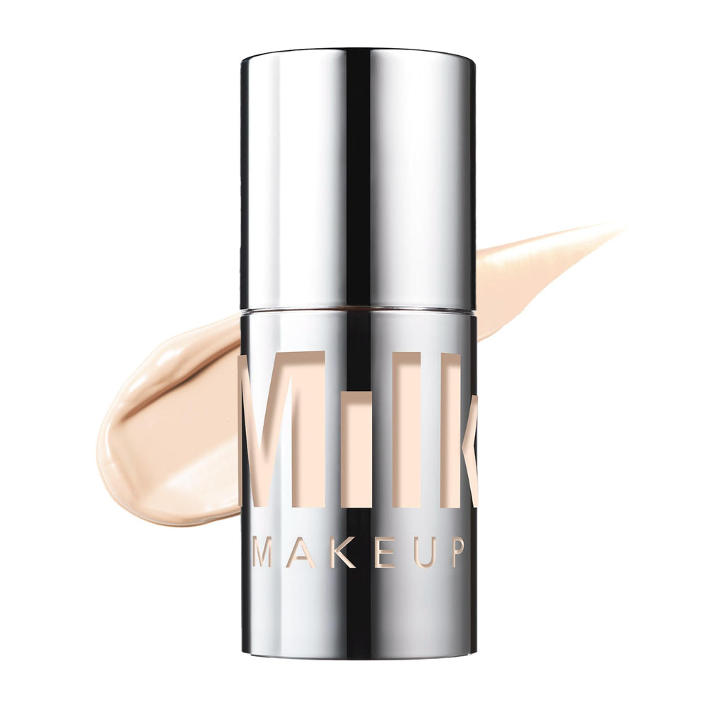 Milk Makeup Future Fluid all-over concealer application for seamless blending.
