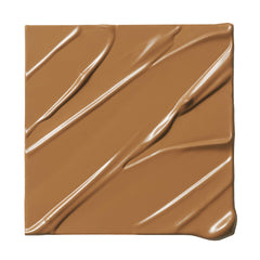 Milk Makeup Future Fluid Concealer 21W swatches show deep warm undertones for natural concealment.