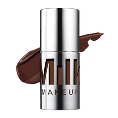 Milk Makeup Future Fluid concealer 29N tube close-up shows rich buildable coverage for dark circles