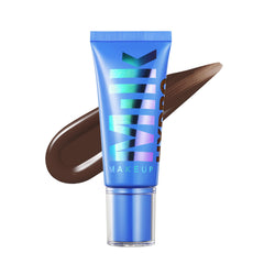 Milk Makeup Hydro Grip Skin Tint bottle closeup showing long-wearing, hydrating gel formula.