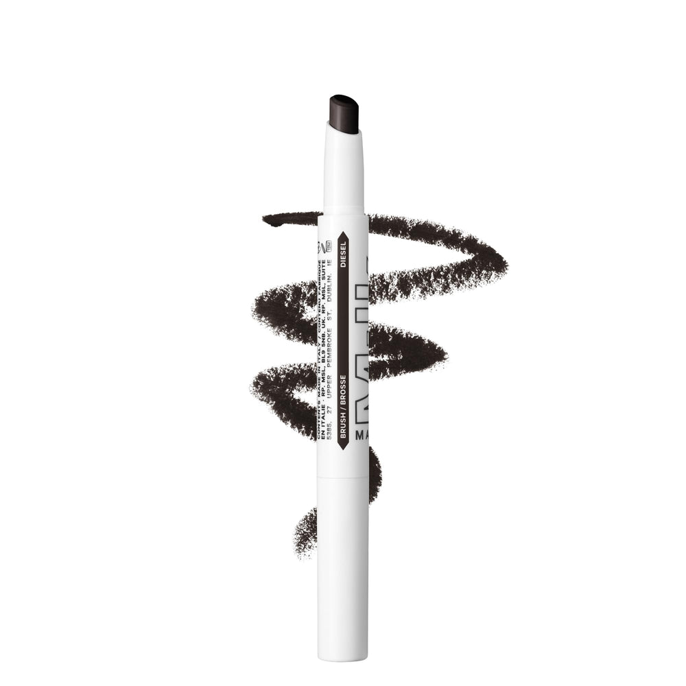Milk Makeup Kush Brow Shadow Stick brow swatch shows warm brown-black shade for natural definition.