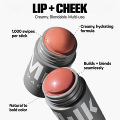 Milk Makeup Lit champagne highlighter on cheekbone for radiant glow.