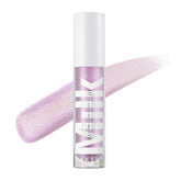 Milk Makeup Odyssey Lip Gloss bottle closeup showing sleek design and shine