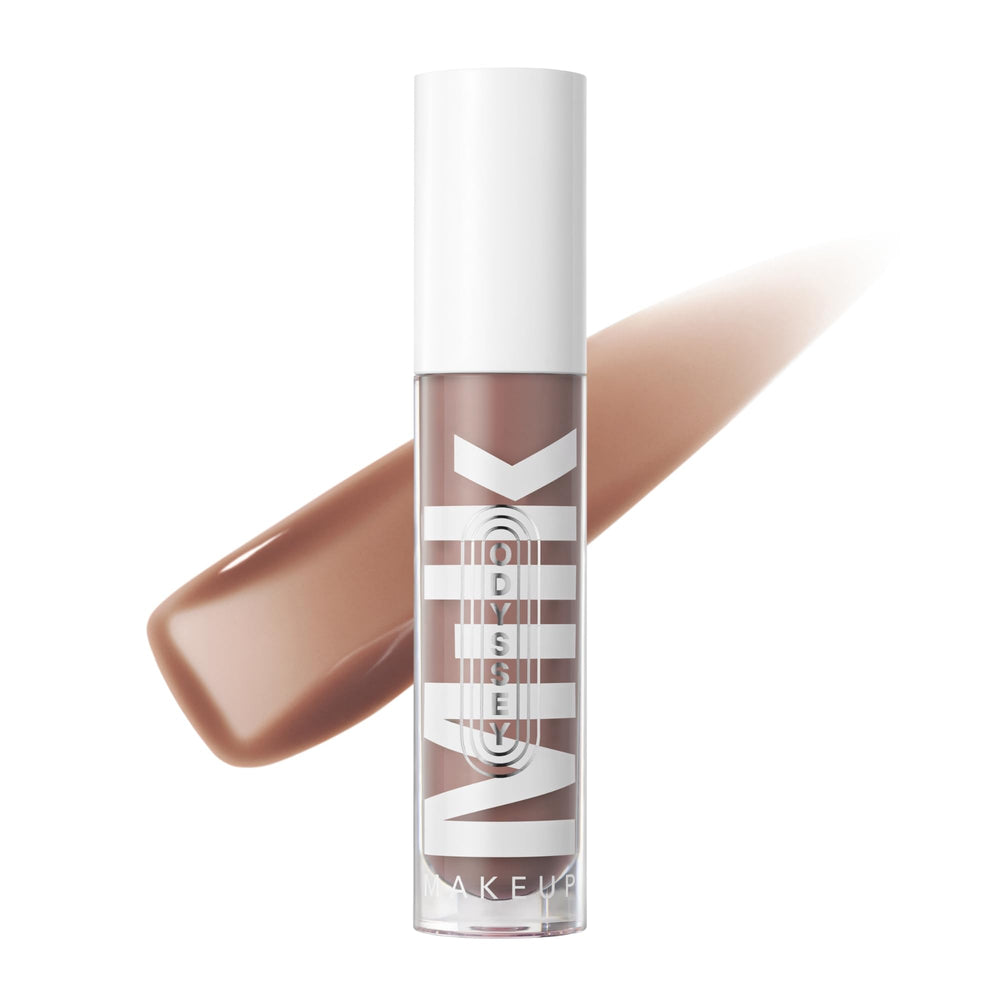 Milk Makeup Odyssey Lip Gloss Quest swatches reveal caramel beige tint with a glossy finish.