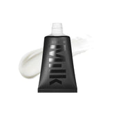 Milk Makeup Pore Eclipse Primer bottle close-up showing pore-blurring effect.