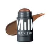 Milk Makeup Sculpt Stick applies cool-toned contour for natural cheekbone depth.