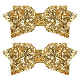 Miroksh glitter Christmas gold bow clip adds festive shine to holiday hairstyles.