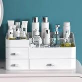 MIUOPUR white makeup organizer on vanity with 3 drawers for easy cosmetics access.