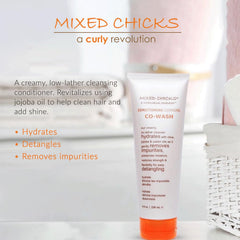 Mixed Chicks Co-Wash ingredients close-up highlighting coconut, castor, jojoba oils for hair nourishment.