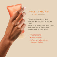 Mixed Chicks Daily Hair Dress being applied for daily nourishing moisture.