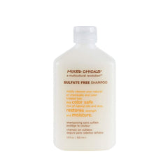 Mixed Chicks sulfate-free shampoo bottle closeup, gentle cleanse for color-treated hair.