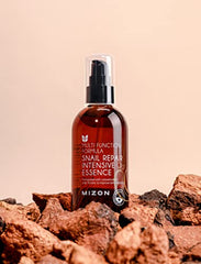 MIZON Snail Repair Intensive Essence with adenosine supports wrinkle care and firmness.