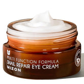 MIZON Snail Line Eye Cream tube close-up highlighting creamy texture and packaging.