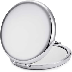 MLLXX compact mirror 2x side helps detailed makeup application and lash checks.