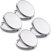 MLLXX compact mirror double-sided in silver offers quick, precise checks for makeup on the go.