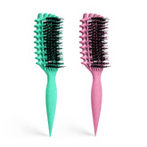 MMBVSZ Candybrush curl-defining brush with ergonomic handle for comfortable detangling.