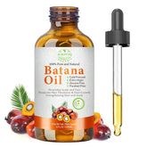 MMPANG Batana Oil bottle pour demonstrates pure organic nourishment for healthier hair.