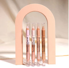 Moira Dual Brow Highlighter Pencil applied under the brow for lift and shape.