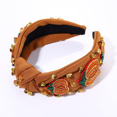 Mokkia headband maple leaf detail adds autumn charm.