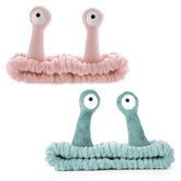 Molain palm-snail headband pink design keeps hair tidy during face washing.