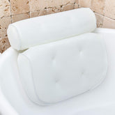 Monsuri bath pillow close-up highlighting 3.9-inch padding for neck and shoulder support.
