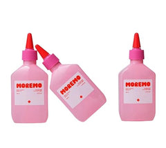 MOREMO Water Treatment bottle closeup highlighting damaged hair care with an advanced formula.