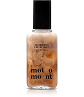Motomont Milk Tea Dewy Skin Mist bottle showcases hydrating formula for dewy makeup.