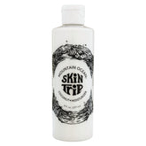 Mountain Ocean Skin Trip coconut body lotion bottle promotes quick absorption for daily hydration.