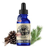 Mountaineer Brand natural beard oil pine tar bottle for hydrated facial hair.