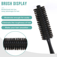 Mozeat Lens boar bristle brush in hand demonstrating gentle styling.