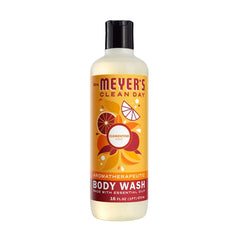 Mrs. Meyer's Clean Day Clementine body wash bottle pour delivers citrus freshness and skin softness.