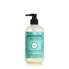 Mrs. Meyer's Clean Day Mint hand soap bottle pour shows energizing mint scent.