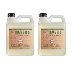 Mrs. Meyer's Clean Day Geranium refill bottle being poured for quick replenishment.