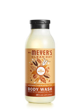 Mrs. Meyer's Clean Day moisturizing body wash bottle being poured for a refreshing cleanse.
