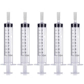 MUB 10ml perfume syringe pump in action for on-the-go refills.